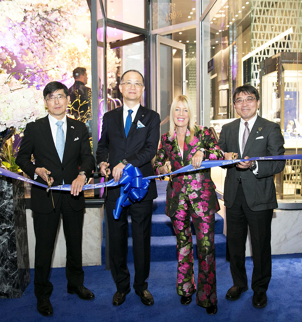 The opening ceremonies included an official ribbon cutting (above) and the traditional opening of a sake cask (below).
