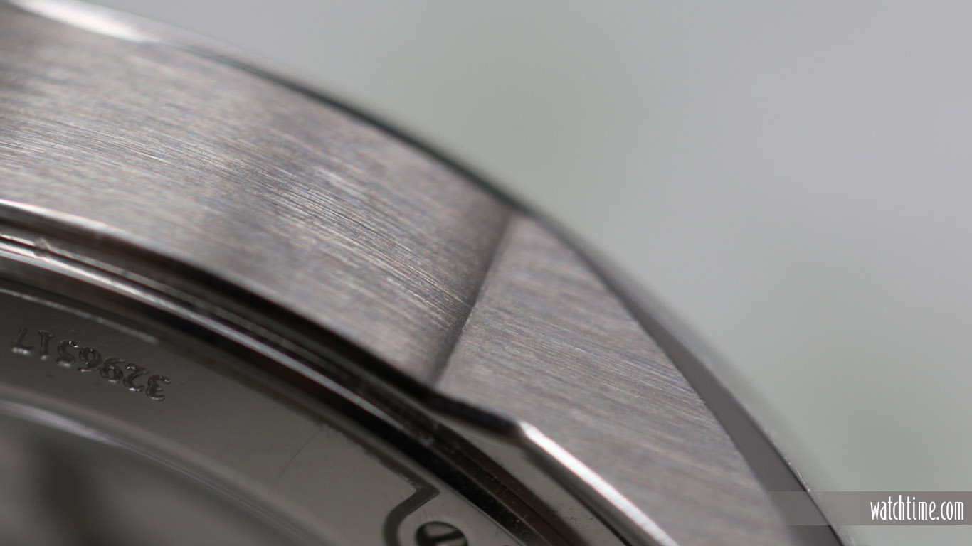 The sides of the case are satin-brushed, with polished angles.