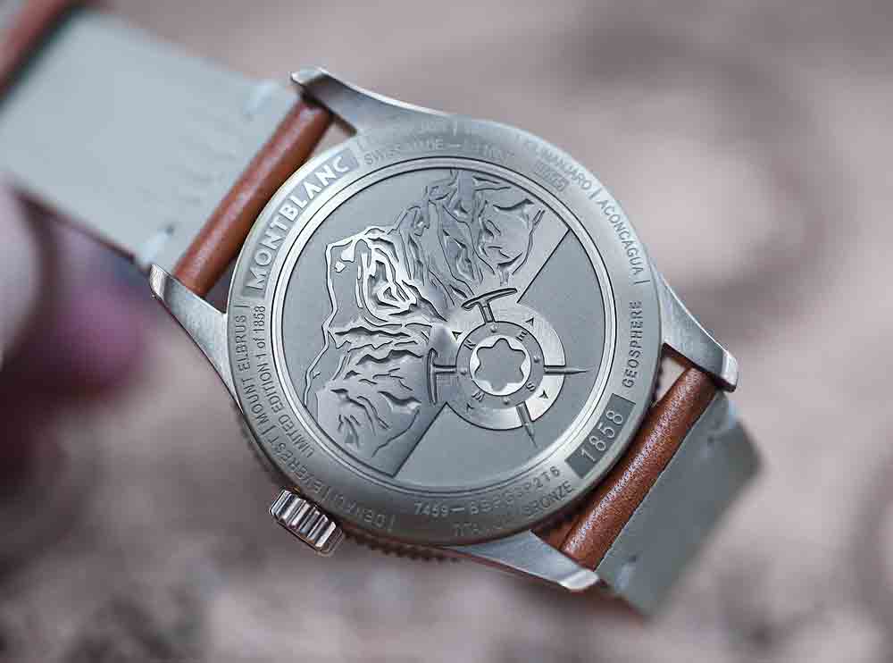 The titanium snap-on caseback is perfectly aligned and PVD treated. It features a list of the Seven Summits, an engraving of the Mont Blanc mountain, a compass symbol and two crossed ice pick-axes.