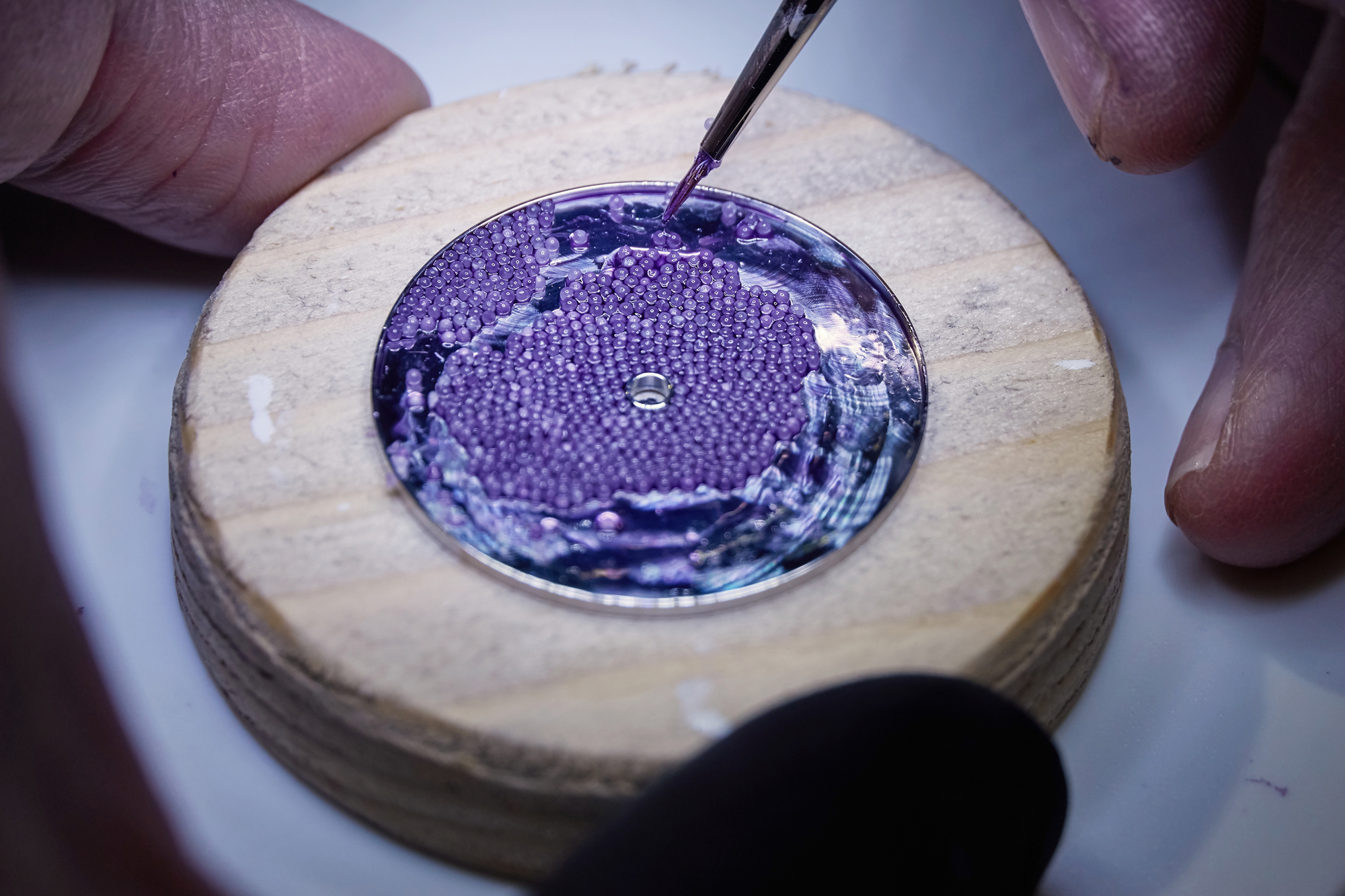 The miniature painting done on the sugar crystals.