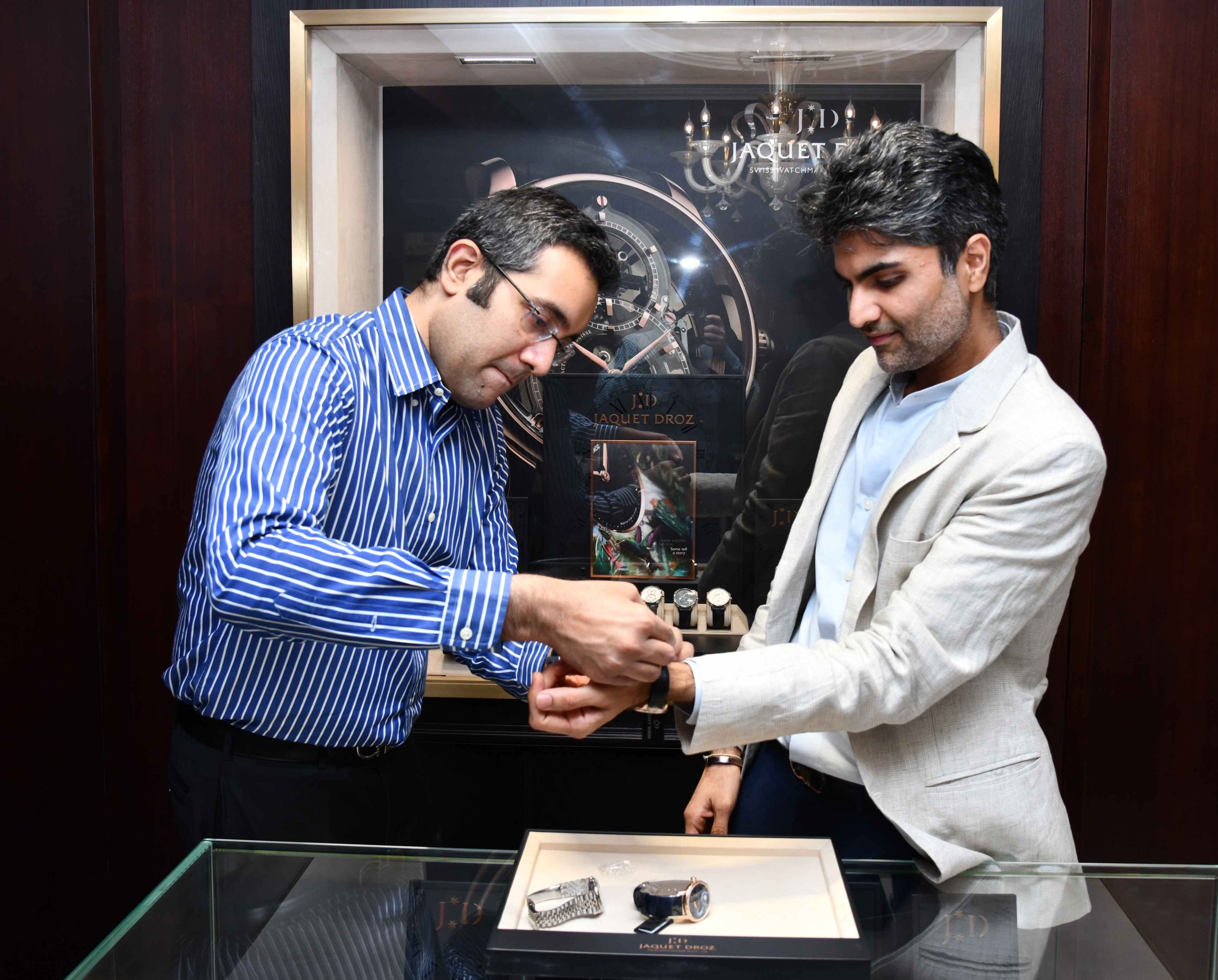 WatchTime India x Jaquet Droz Ankit Madan of Johnson Watch Company helps Punit Mehta of RedBar Mumbai try on a Jaquet Droz watch
