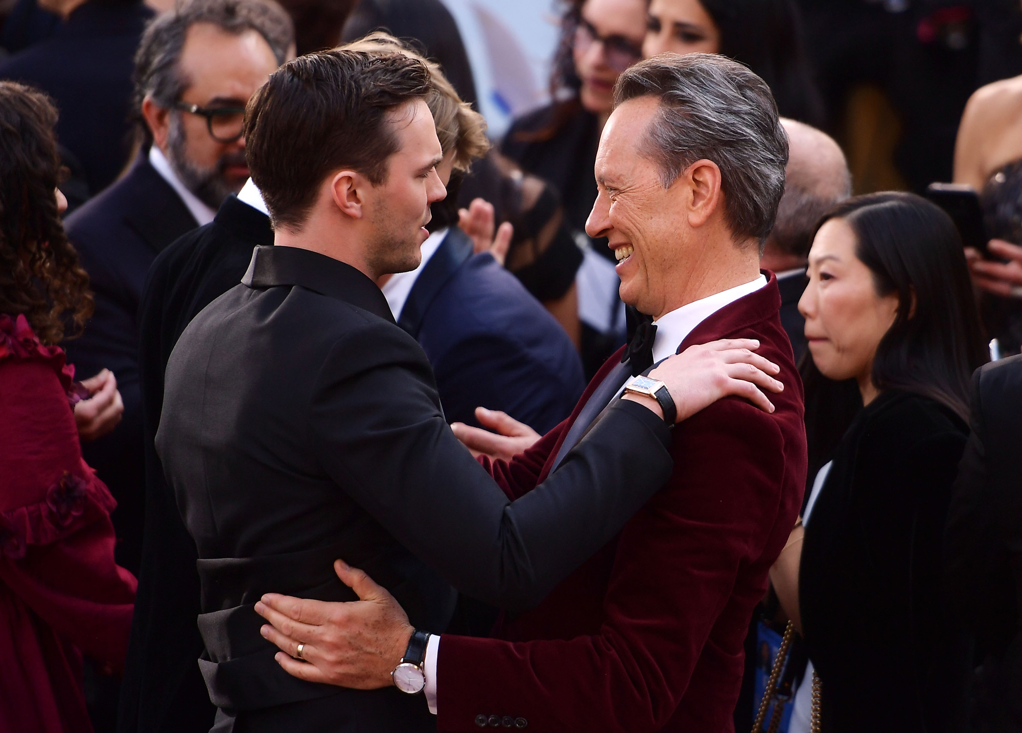 (left to right) Nicholas Hoult wearing the Reverso Classic Duoface Large and Richard E. Grant wearing the Master Ultra Thin Date.