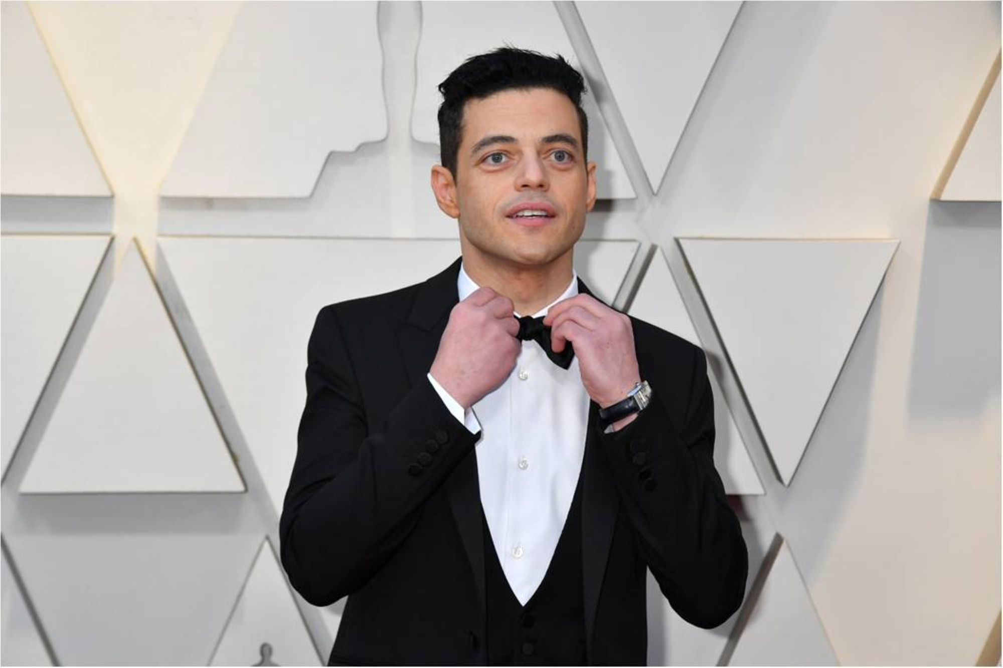 Rami Malek wearing the Cartier Tank Americaine