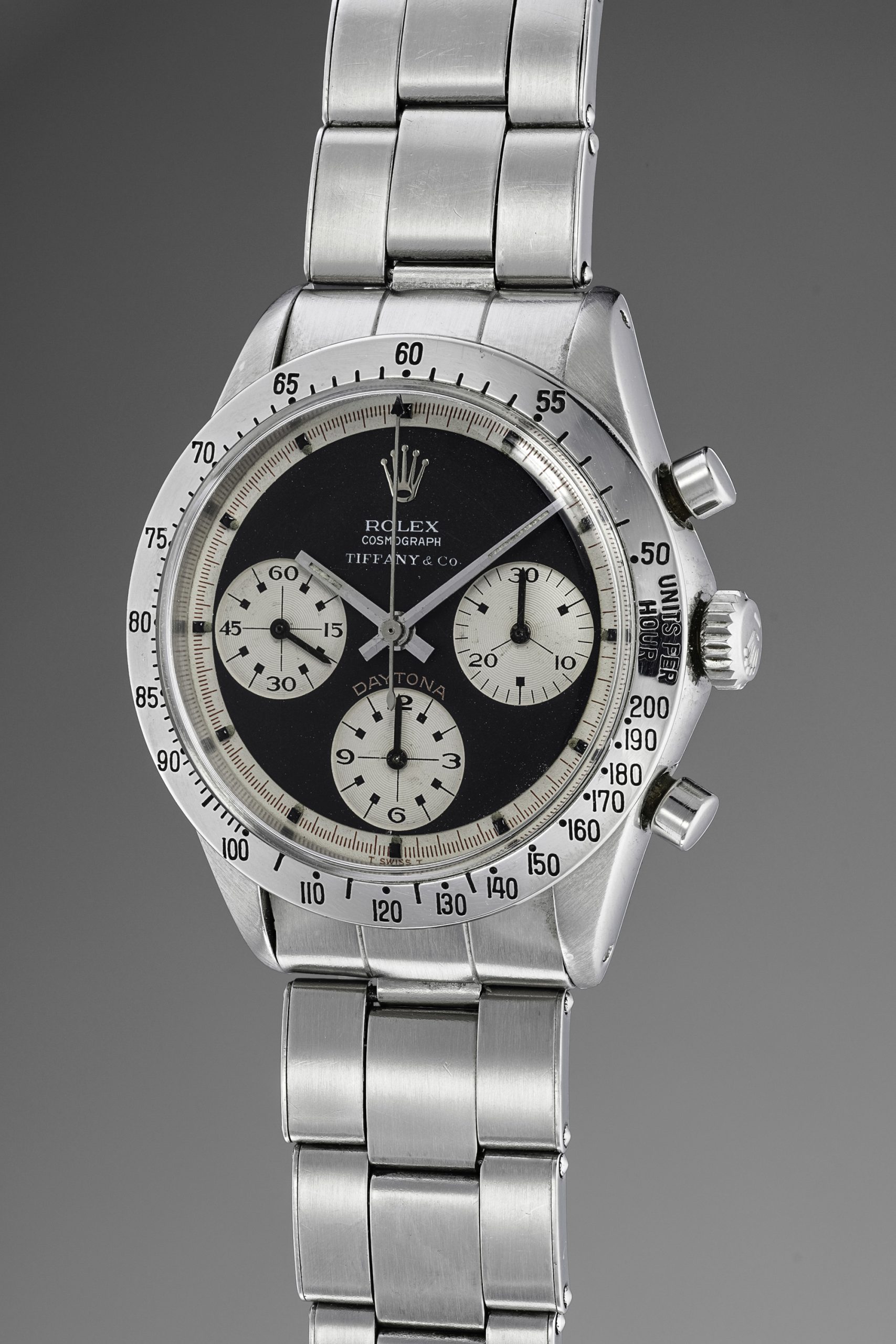 An exceedingly rare and attractive stainless-steel chronograph wristwatch with “Paul Newman” dial and bracelet, retailed by Tiffany & Co.
