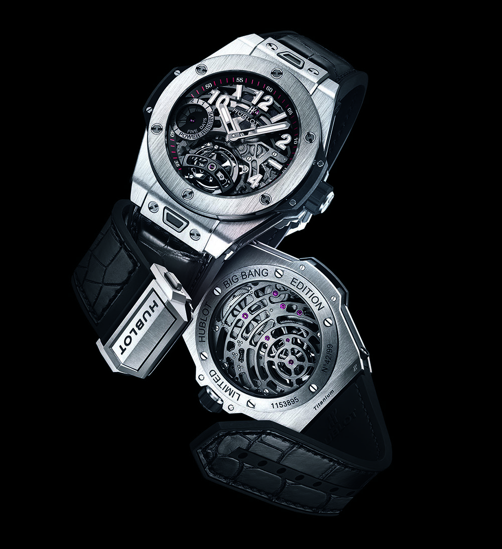 REFERENCE: 405.NX.0137.LR MOVEMENT: In-house HUB6016 based on the HUB6010, hand-wound, tourbillon, power-reserve indicator, diameter = 34 mm, height = 5.7 mm, ratchet wheel, 21,600 vph, 25 jewels, 50-hour power reserve CASE: Titanium with black composite resin, diameter = 45 mm, height = 13.2 mm, flat sapphire crystal with non-reflective coating on the inside, screw-down crown, sapphire caseback secured with six screws, water-resistant to 30 meters STRAP AND CLASP: Rubber and alligator strap with titanium safety buckle VARIATIONS: Rose gold (99 pieces) Limited edition: 99 pieces