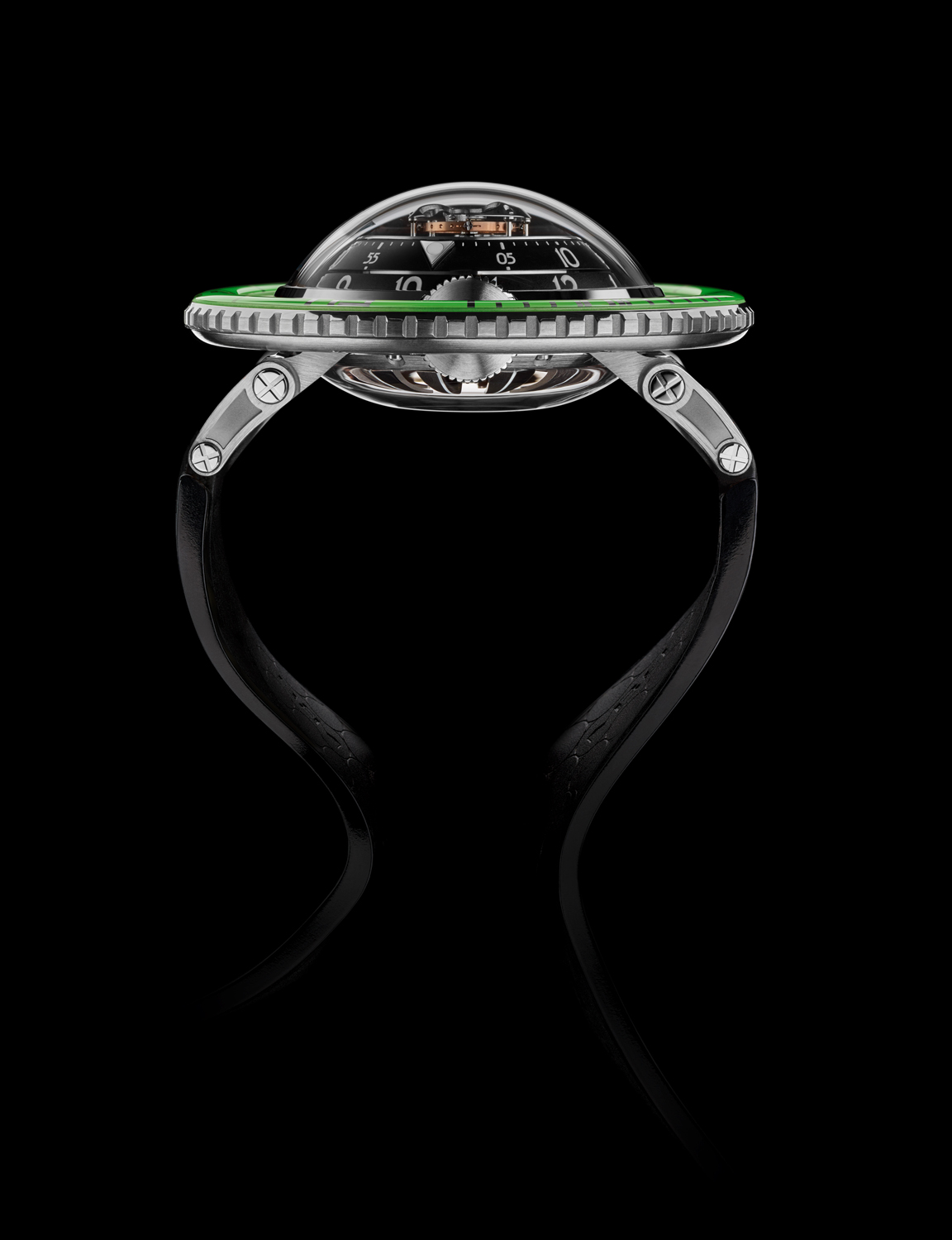 While Horological Machine N°7 is not a dive watch, it is a timepiece comfortably at home in the water – so MB&F added the one element that all serious aquatic watches possess: a unidirectional rotating bezel. However, unlike every other dive watch on the planet, Aquapod’s bezel isn’t attached to the case, but floats apart like a life buoy.