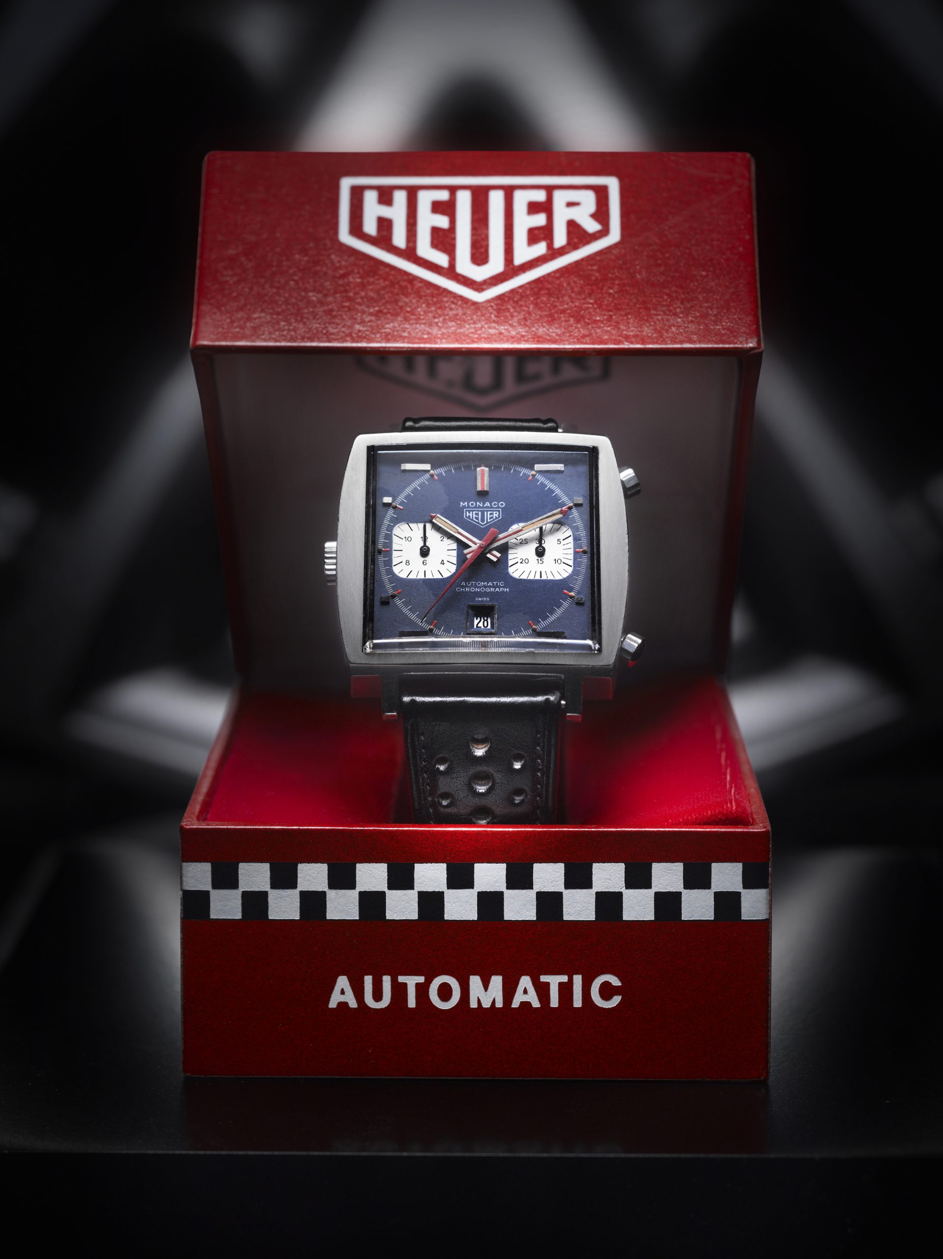 The original Heuer Monaco 1133B in its original box. 