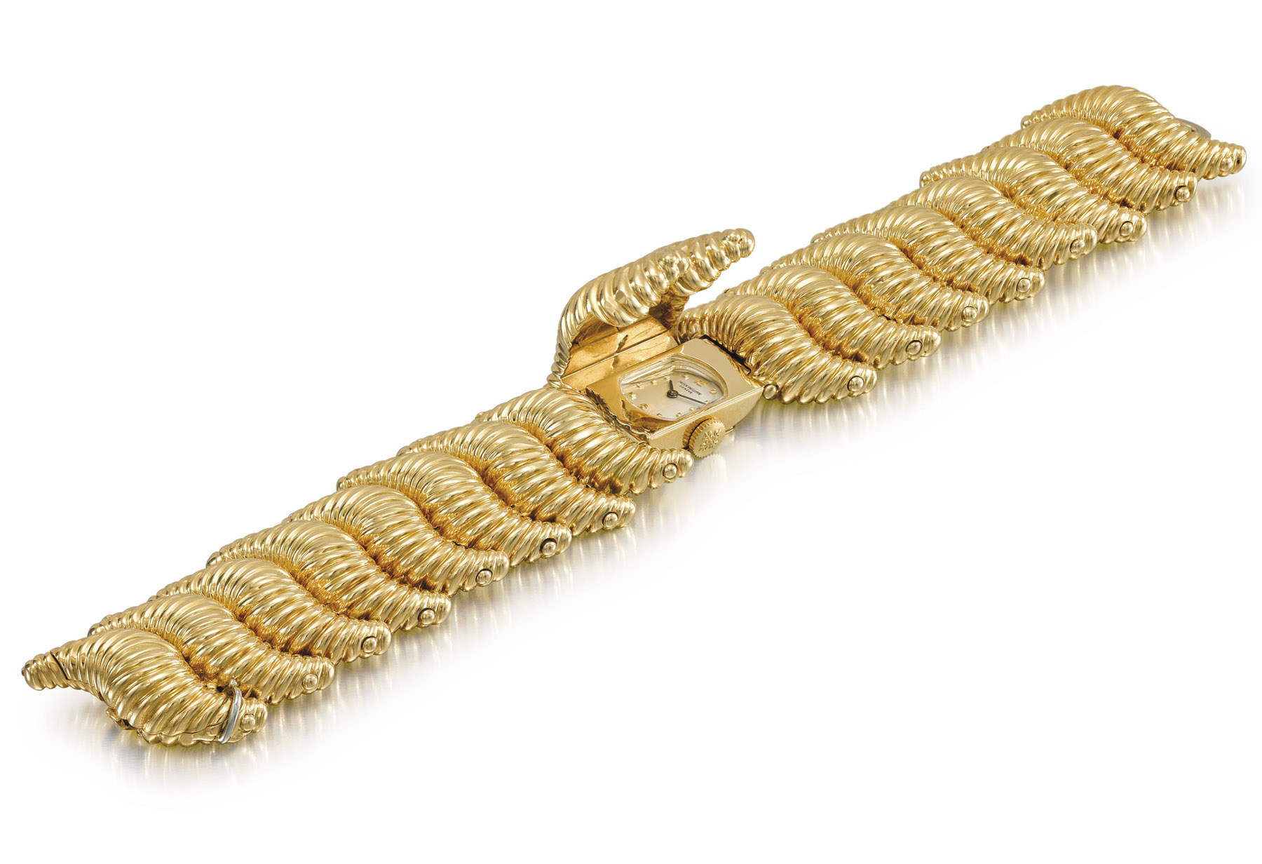 Patek Philippe. A lady's unusual, heavy and rare 18K pink gold bracelet watch with concealed dial Ref. 2252-1, made in 1954 Estimate CHF 12,000 – 18,000