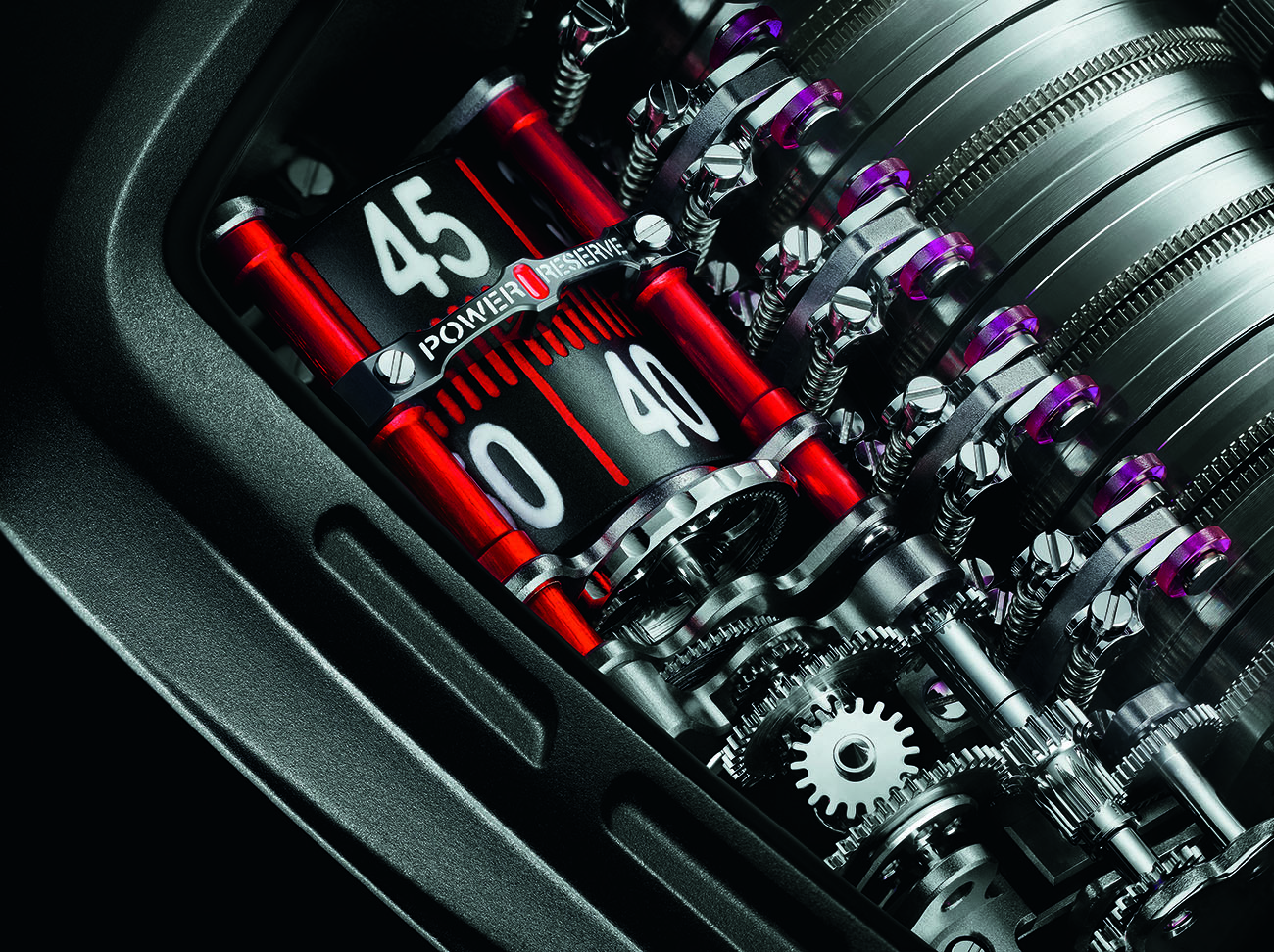 The manually-wound Calibre HUB9005 has 11 vertically arranged barrels which provide a power reserve of 50 hours. The cylinders also display the hours, minutes and power reserve, along with a vertical tourbillon.