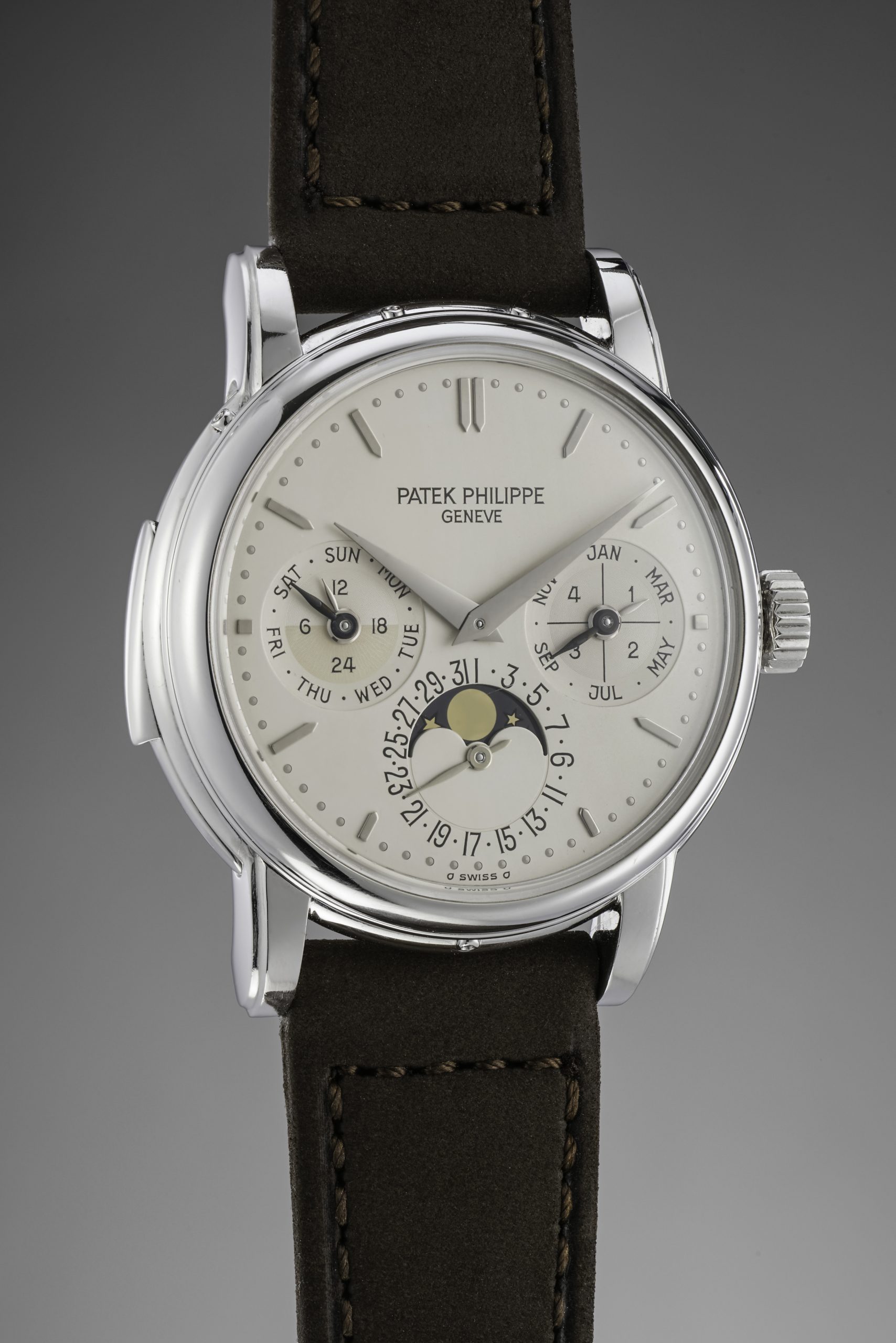 The movement beating in the heart of this masterpiece is Patek Philippe’s caliber 27RQ, a 6.80mm thick movement comprised of 467 components. This ultra-complex mechanism is housed in a case whose downturned stepped lugs are reminiscent of another of Patek Philippe’s iconic timepieces: the perpetual calendar chronograph reference 2499. Patek Philippe turned to Jean-Pierre Hagmann (whose initials are proudly stamped inside the solid caseback and inner lug), a living legend among case makers, to create a case that would not only be a beautiful frame for the watch but could also act as a superb sound carrier for the repeater’s delicate chimes. Patek Philippe discontinued this reference in 2000, and given how complex it was to manufacture, very few examples were made over its 11-year production period. In fact, the present example is only the eighth known in platinum.