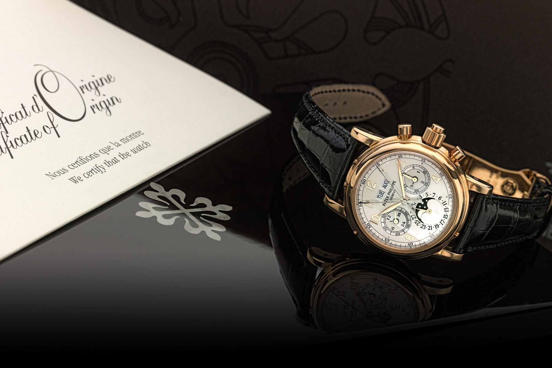 A Fine Pink Gold Perpetual Calendar Split Seconds Chronograph Wristwatch With Moon-Phases Leap Year And 24 Hour Indication Ref 5004 Mvt 879877 Case 4115668 Made In 2004