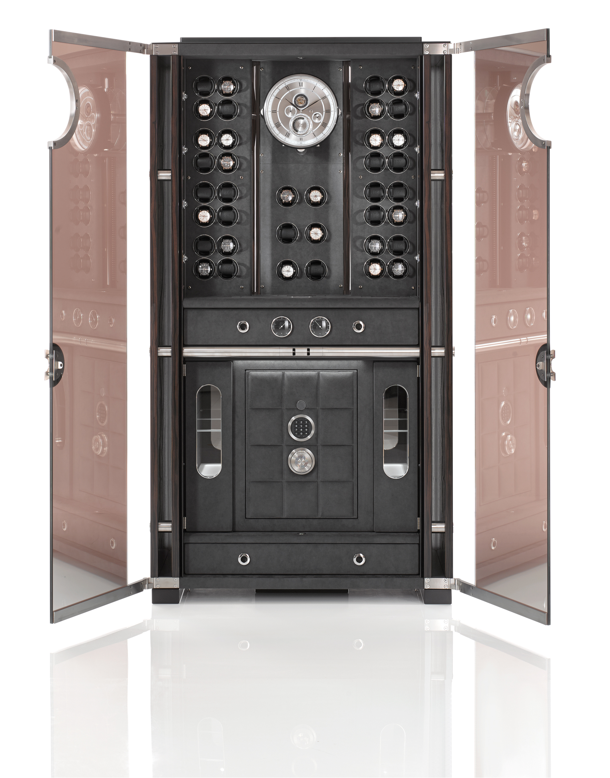 The new Solitaire Vision is the most recent example of the BUBEN&ZORWEG Object of Time® collection. Its inner values, protected by bullet-proof spy glass, inspire a high sense of security and strength. Within, 46 Time Mover® can hold a collection of automatic watches, some of them in the integrated VdS-certified safe that forms the core of the whole ensemble. The clock is a central element and a highlight of the Objects of Time®. Featuring a world time indication and a tourbillon escapement, it connects the interior with the exterior, between the closed and the inviting open state.