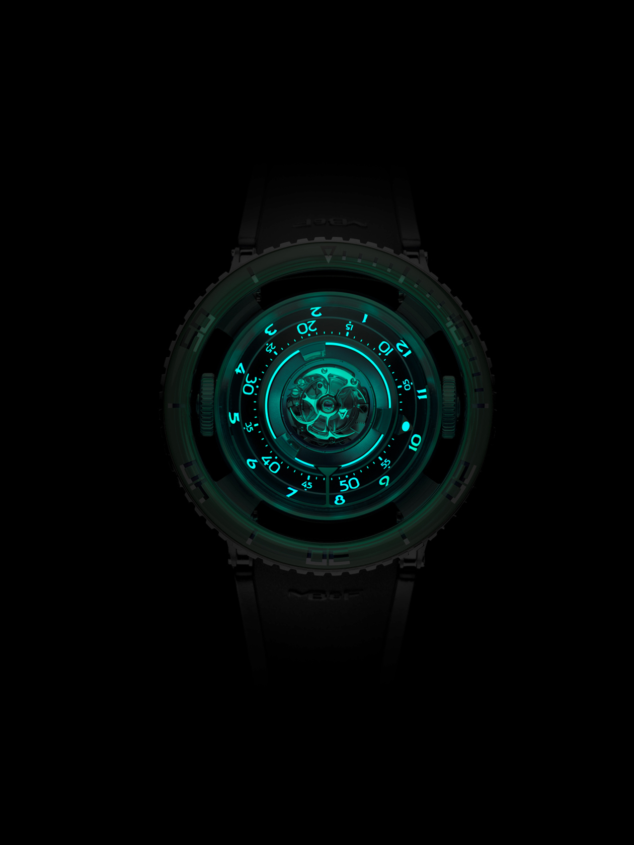 Like many jellyfish, HM7 glows in the dark. It glows where you would expect it to – on the hour and minute numerals – but also around the inside of the movement, to light up that flying tourbillon at night... and in addition, along the tentacle-like winding rotor so that its operation, too, can be appreciated in the dark.