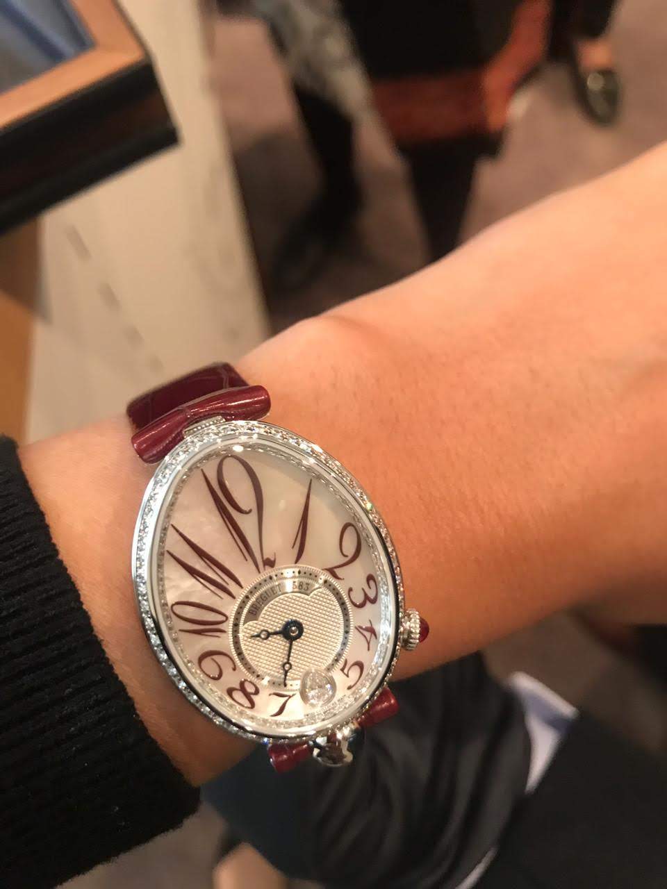 The second Reine de Naples comes in a silvered gold dial and a hand guilloche hour-minute sub dial. 